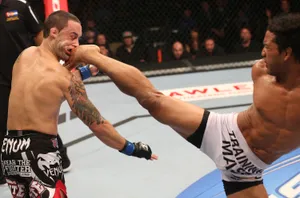 Ben Henderson Roundhouse Kick Still To Frankie Edgar Wallpaper