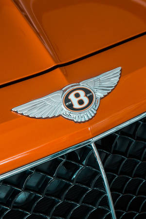 Bentley Cars Logo On Orange Wallpaper