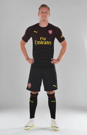Bernd Leno Posing In Black Wallpaper