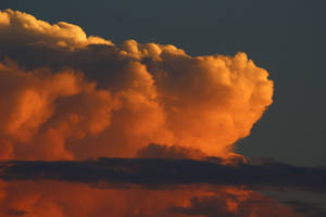 Big Orange Clouds Aesthetics Wallpaper