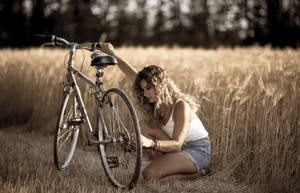 Bike Lover In A Wheat Field Wallpaper