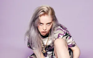 Billie Eilish In A Purple Background Wallpaper