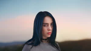 Billie Eilish On Her Laptop Wallpaper