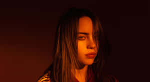 Billie Eilish On Her Laptop Wallpaper