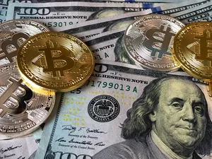 Bitcoin And Us Dollar Coins On A White Background Wallpaper