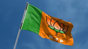 Bjp Flag Raised Against The Sky Wallpaper