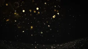 Black And Gold Glitter Large Particles Wallpaper