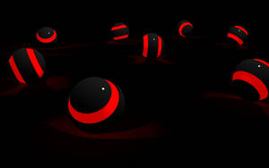 Black Balls With Cool Red Lights Wallpaper
