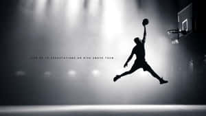 Black Basketball Jordan Dunking Wallpaper