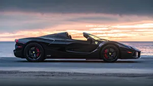 Black Car 4k Ferrari Sunset Beach Wallpaper