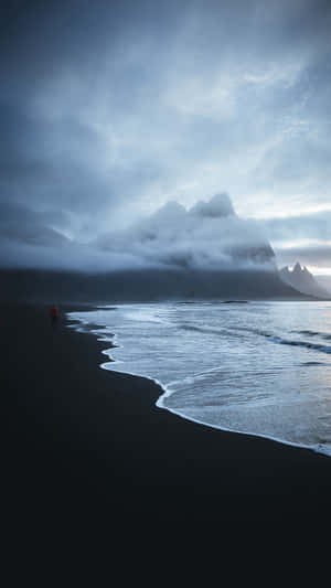 Black Clouds At The Beach Wallpaper