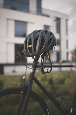 Black Cycling Helmet On Bike Wallpaper