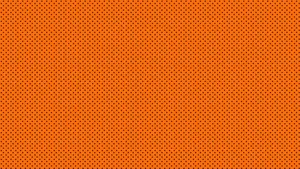 Black Dots On An Orange Background Wallpaper