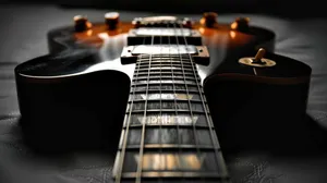 Black Electric Guitar Close Up Wallpaper