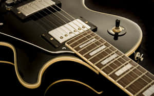 Black Electric Guitar Closeup Wallpaper
