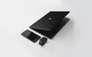 Black Macbook And Apple Gadgets Wallpaper
