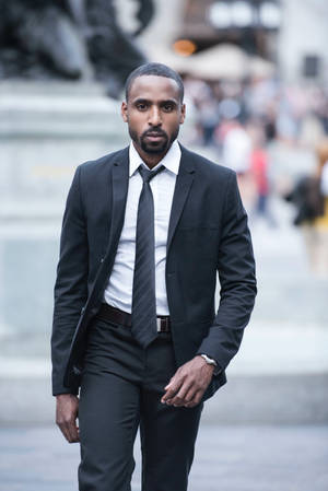 Black Man In A Business Suit Wallpaper