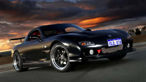 Black Mazda Rx 7 With Stormy Sky Wallpaper