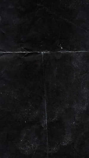Black Plastic Texture Reflecting A Modern, Industrial Aesthetic Wallpaper