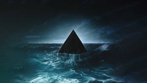 Black Pyramid On Ocean Wallpaper