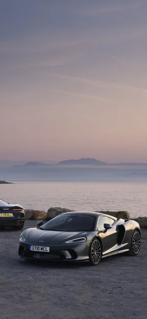 Black Sports Car Iphone 13 Pro Wallpaper