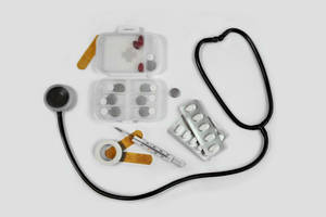 Black Stethoscope And Medicines Wallpaper