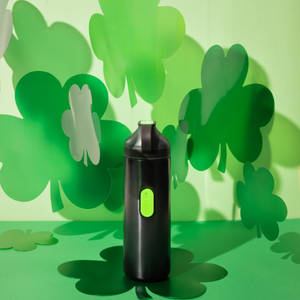 Black Water Bottle With Saint Patrick’s Day Imagery Wallpaper