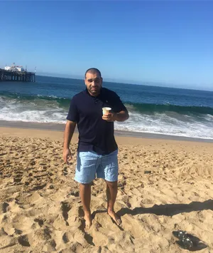 Blagoy Ivanov Drinking On Beach Wallpaper