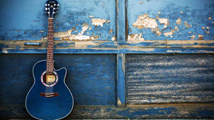 Blue Acoustic Guitar Flaking Paint Wallpaper