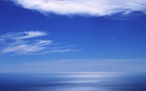 Blue Aesthetic Cloud And Ocean Wallpaper