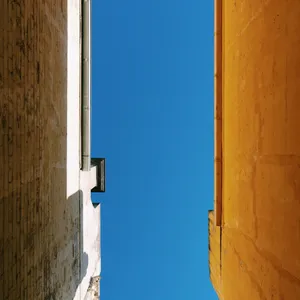 Blue Aesthetic Sky Between Buildings Wallpaper