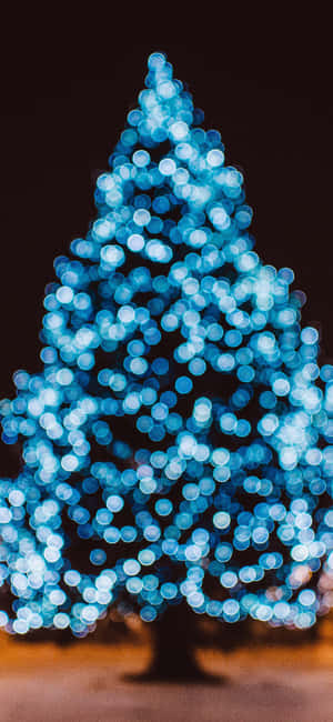 Blue Christmas Tree Glowing Wallpaper