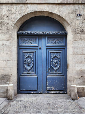 Blue Door Entrance Of Trudaine Family Residence Wallpaper