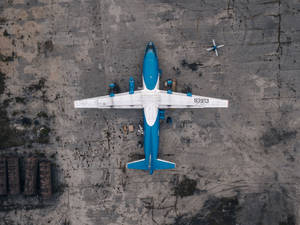 Blue Hd Plane Aerial View Wallpaper