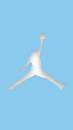Blue Jordan's Sneakers In Action On A Matching Background Wallpaper