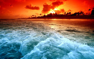 Blue Ocean Waves Orange Sunset Wallpaper