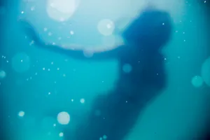 Blurred Water Mermaid Wallpaper