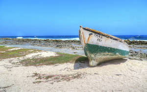 Boat At Aruba Baby Beach Wallpaper