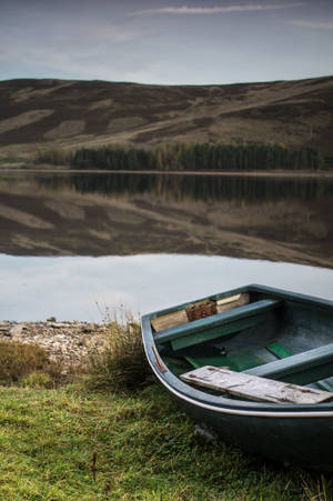 Boat Near A Lake Wallpaper
