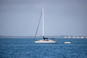 Boat On A Vast Ocean Wallpaper