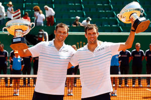 Bob Bryan Raising Trophy Wallpaper