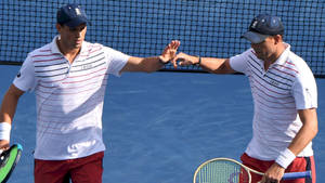 Bob Bryan Touching Hands With Twin Wallpaper