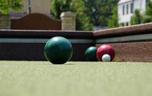 Bocce Ball Game In Action Wallpaper