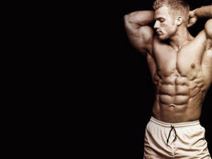 Bodybuilder Savoring His Looks Hd Wallpaper