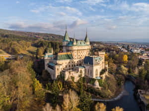 Bojnice Castle Beneath The Clouds Wallpaper