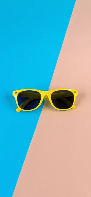 Bold And Bright Color Combination Of Pink, Yellow And Blue Wallpaper