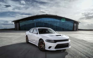 Bold And Powerful - Dodge Charger In Action Wallpaper