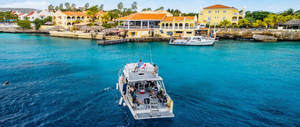 Bonaire Boat In Sea Wallpaper