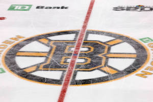 Boston Bruins Logo On Skating Rink Wallpaper