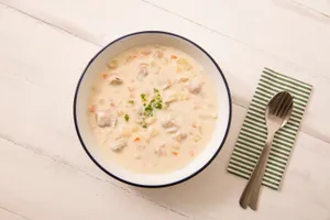 Bowl Of Thick New England Clam Chowder Wallpaper